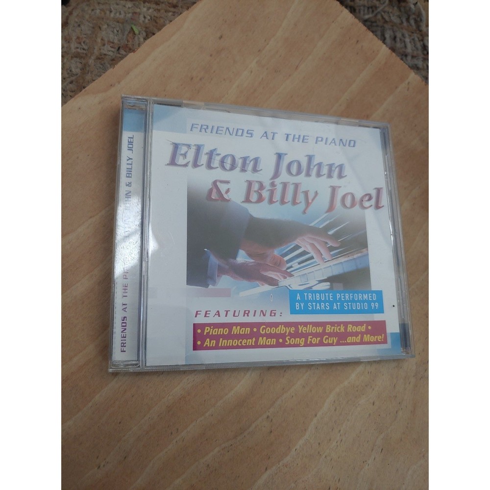 CD. Friends at the piano Elton John and Billy Joel